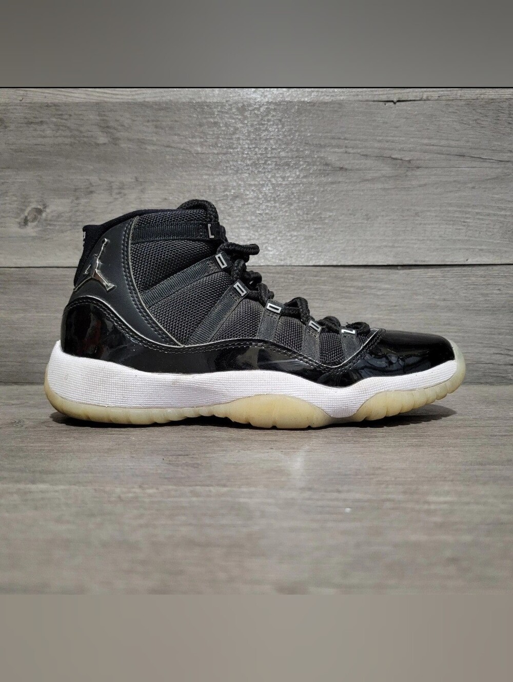 Jordan Kids Black and White High-Top Sneakers